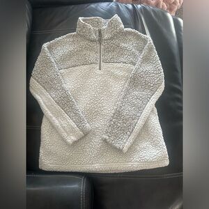 Dylan 1/4 zip side pockets, grey and white.